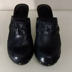 Black leather clogs by Z Universe